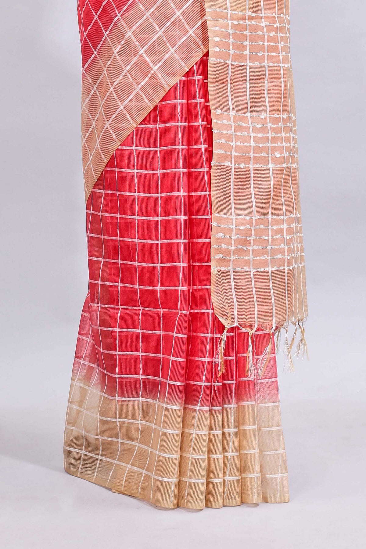 Pink checked linen cotton saree with contrast border and striped blouse