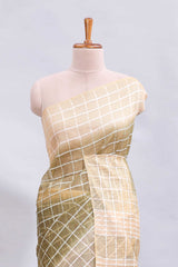 Green checked linen cotton saree with contrast border and striped blouse