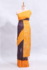 Purple checked shibori motifs design linen cotton saree with contrast border and checked blouse