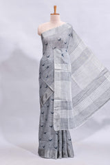 Grey unique motifs design linen cotton saree with self border and striped blouse