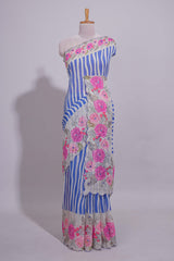 White Linen saree with blue stripes and vibrant pink floral scallop border with contrast printed blouse