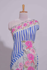 White Linen saree with blue stripes and vibrant pink floral scallop border with contrast printed blouse