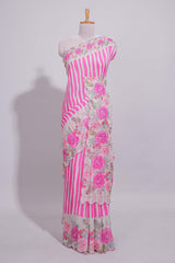 White Linen saree with pink stripes and vibrant pink floral scallop border with contrast printed blouse