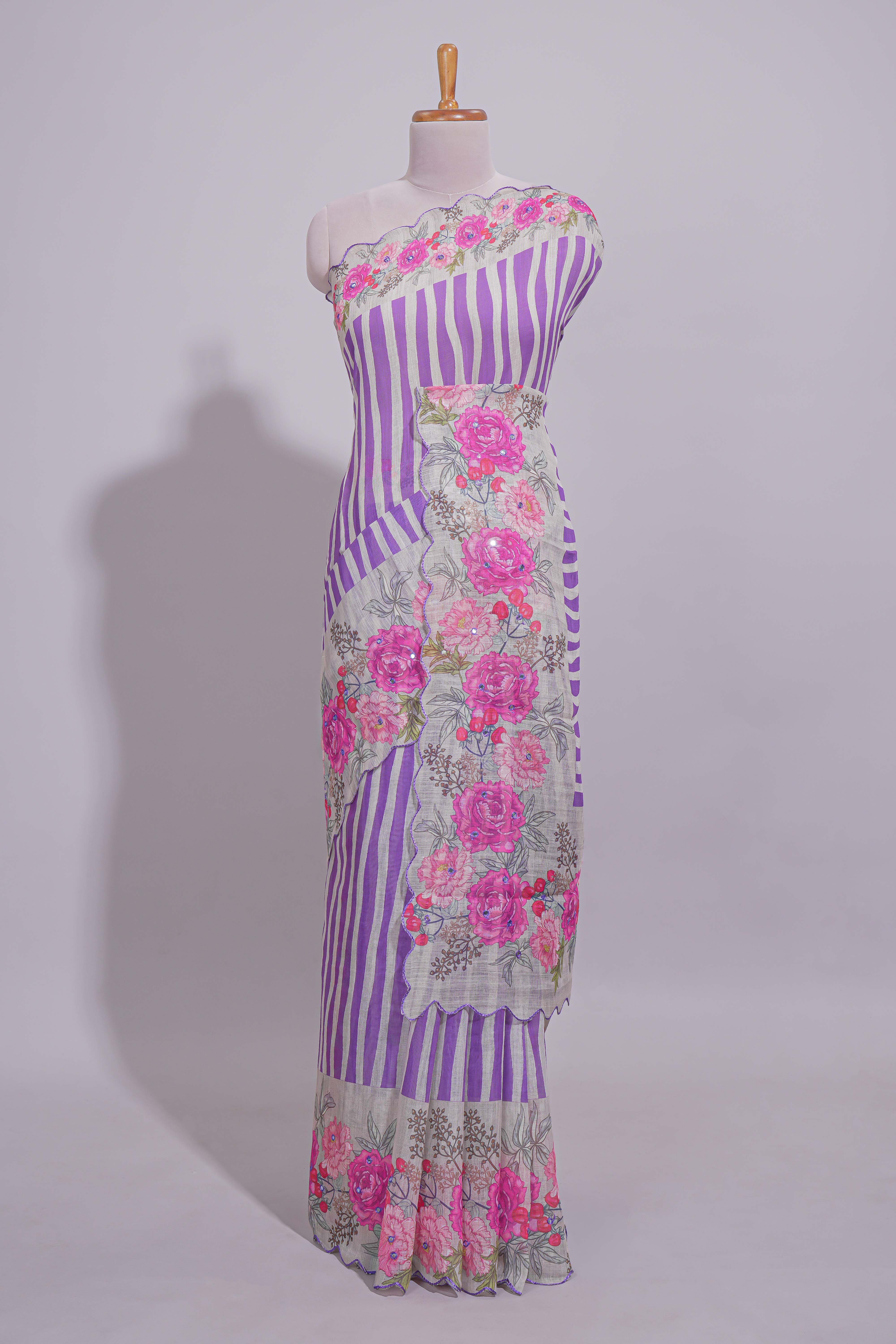 White Linen saree with violet stripes and vibrant pink floral scallop border with contrast printed blouse