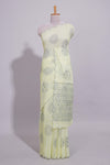 Pastel yellow linen saree tree motifs and tiny sequin with scalloped border and matching blouse