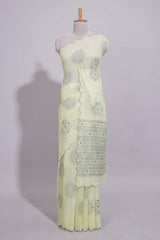 Pastel yellow linen saree tree motifs and tiny sequin with scalloped border and matching blouse