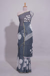Charcoal grey linen saree with bold white floral and geometric prints finished with a subtle metallic border along with matching blouse