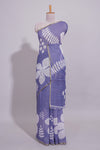 Tropical indigo linen saree with bold white floral and geometric prints finished with a subtle metallic border along with matching blouse