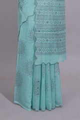 Pastel blue linen saree tree motifs and tiny sequin with scalloped border and matching blouse