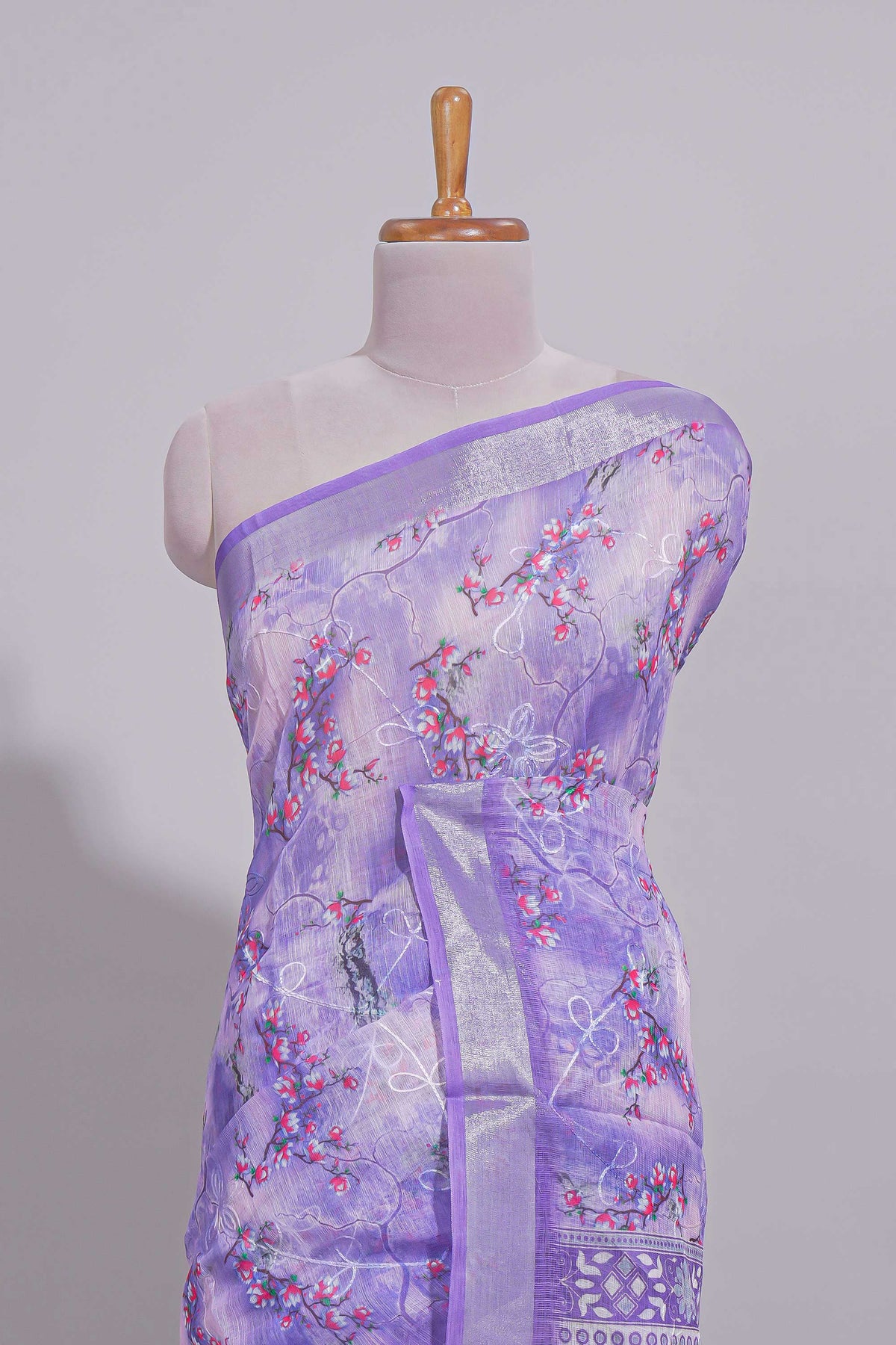 Purple Floral printed linen cotton saree with contrast zari  border and geometric pallu along with matching blouse