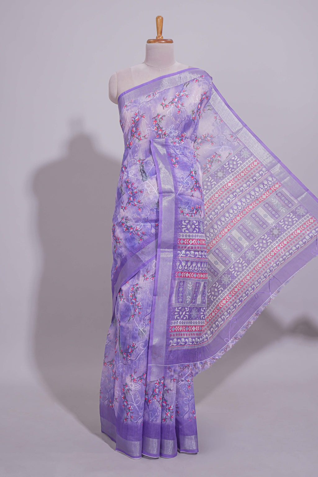 Purple Floral printed linen cotton saree with contrast zari  border and geometric pallu along with matching blouse