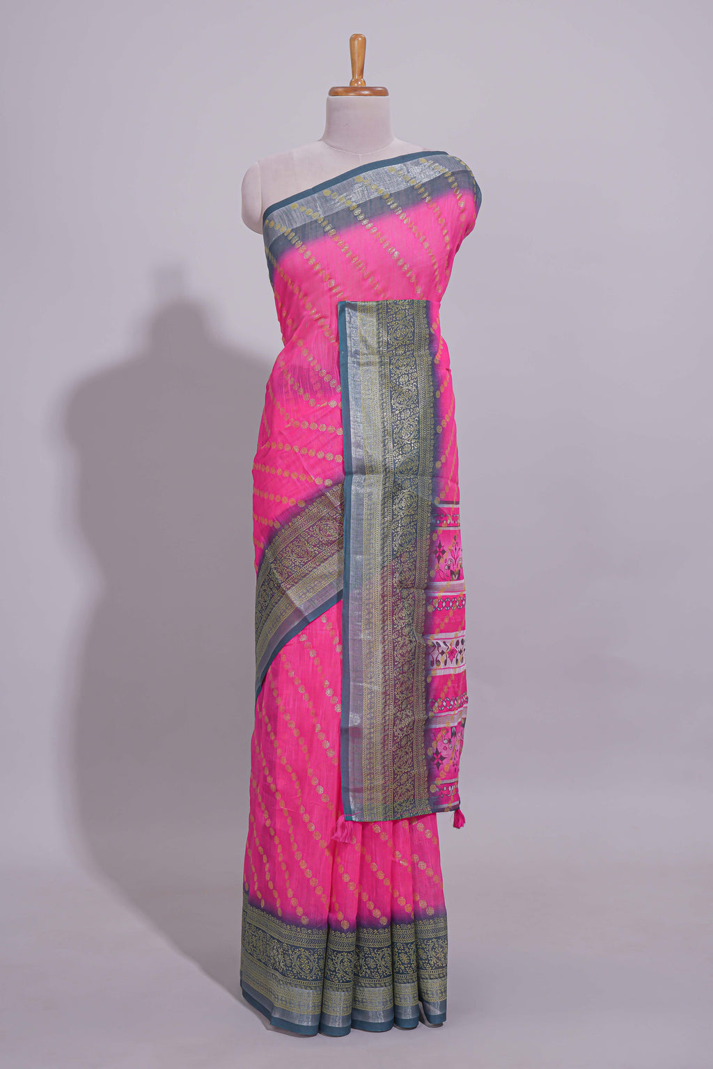 Pink colour linen cotton saree with zari striped body and contrast border with geometric pallu along with contrast blouse