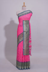 Pink colour linen cotton saree with zari striped body and contrast border with geometric pallu along with contrast blouse