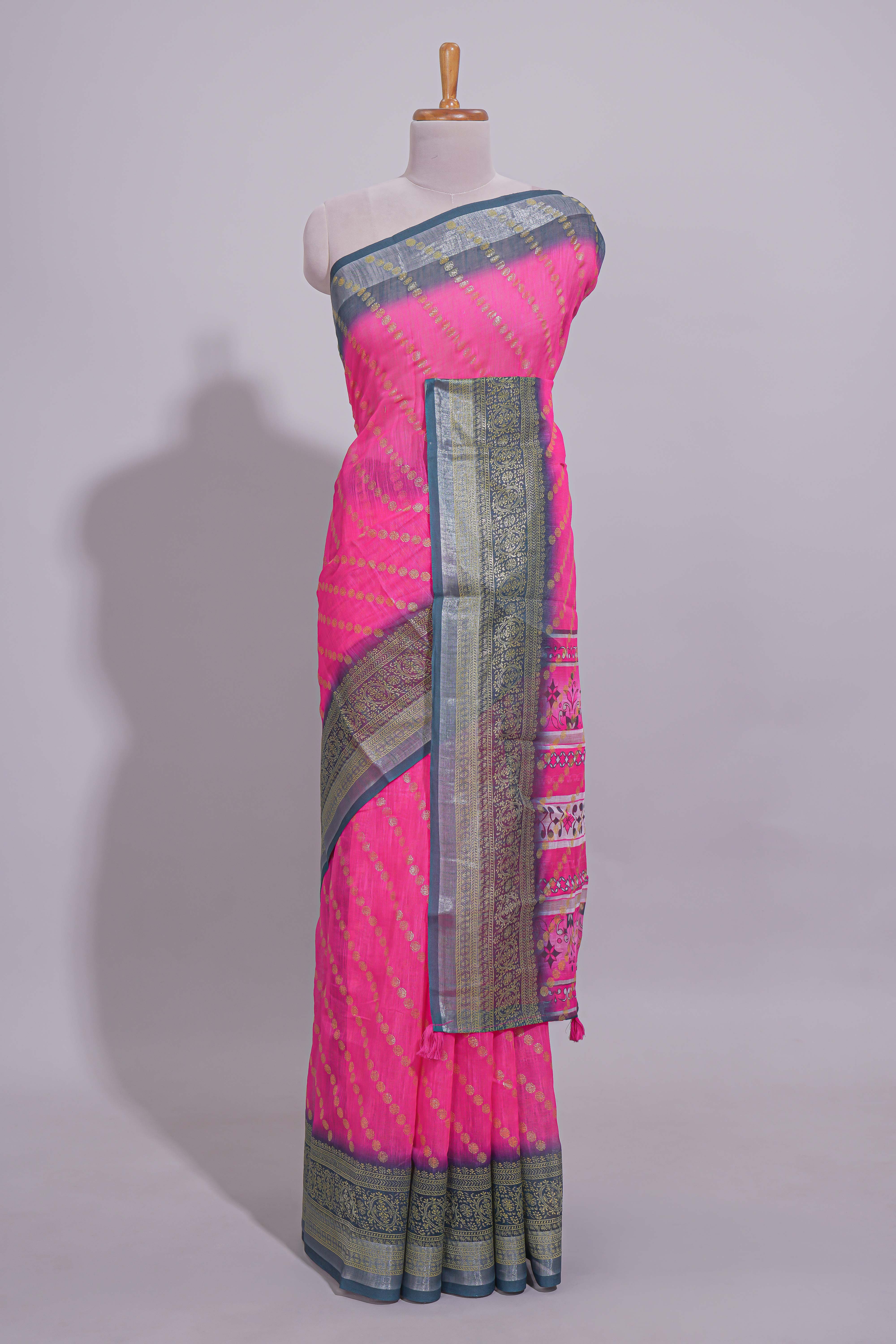 Pink colour linen cotton saree with zari striped body and contrast border with geometric pallu along with contrast blouse