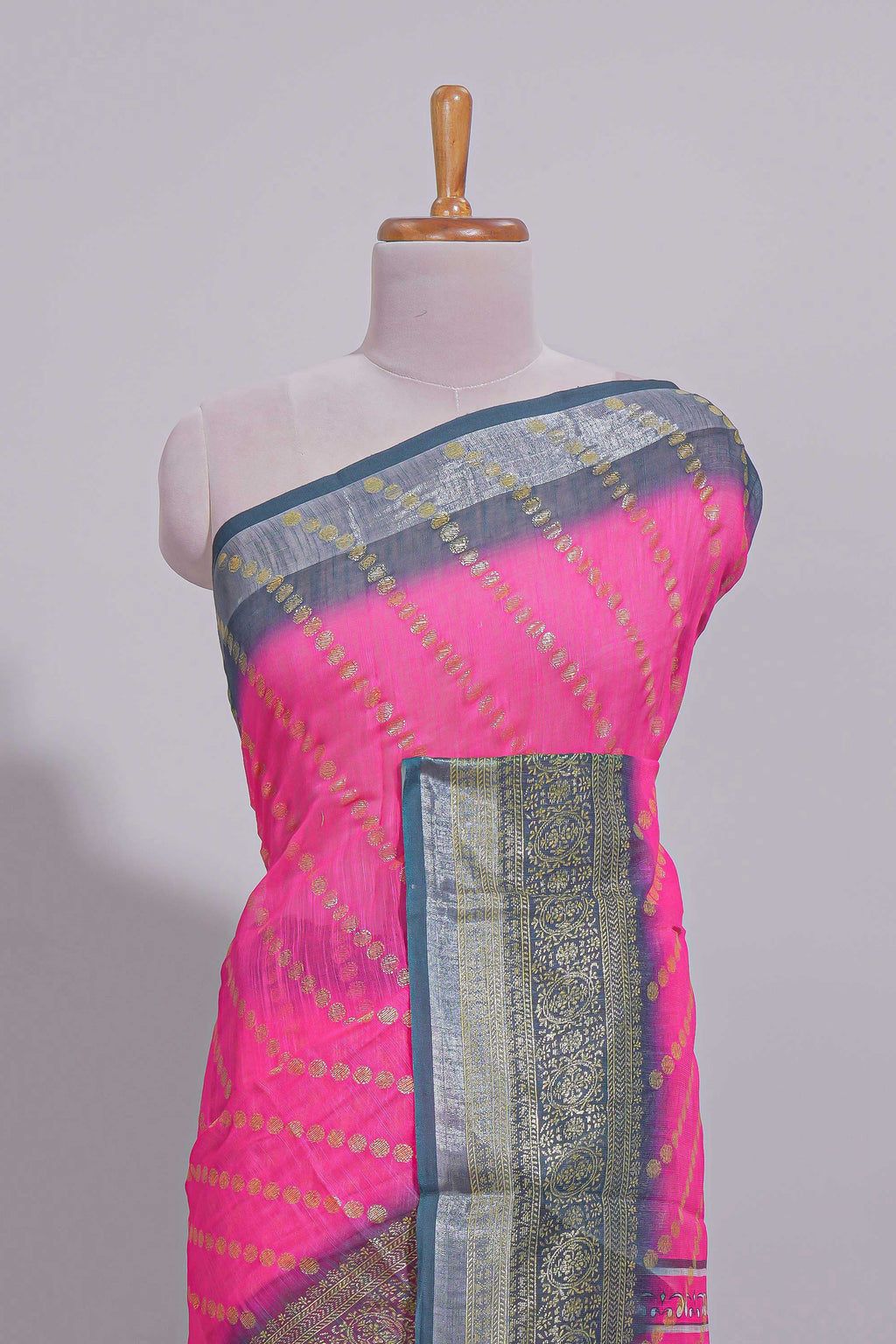 Pink colour linen cotton saree with zari striped body and contrast border with geometric pallu along with contrast blouse
