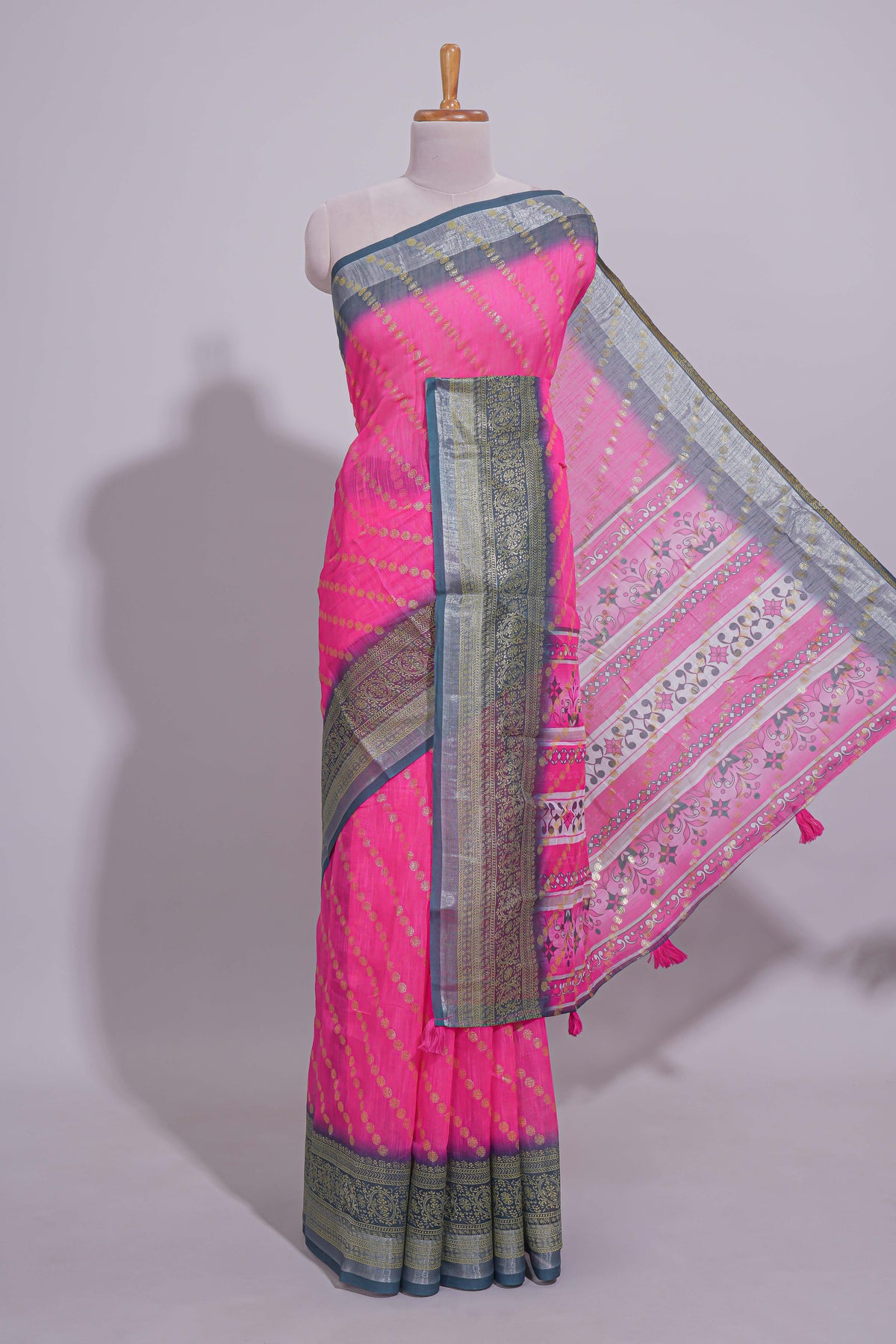 Pink colour linen cotton saree with zari striped body and contrast border with geometric pallu along with contrast blouse