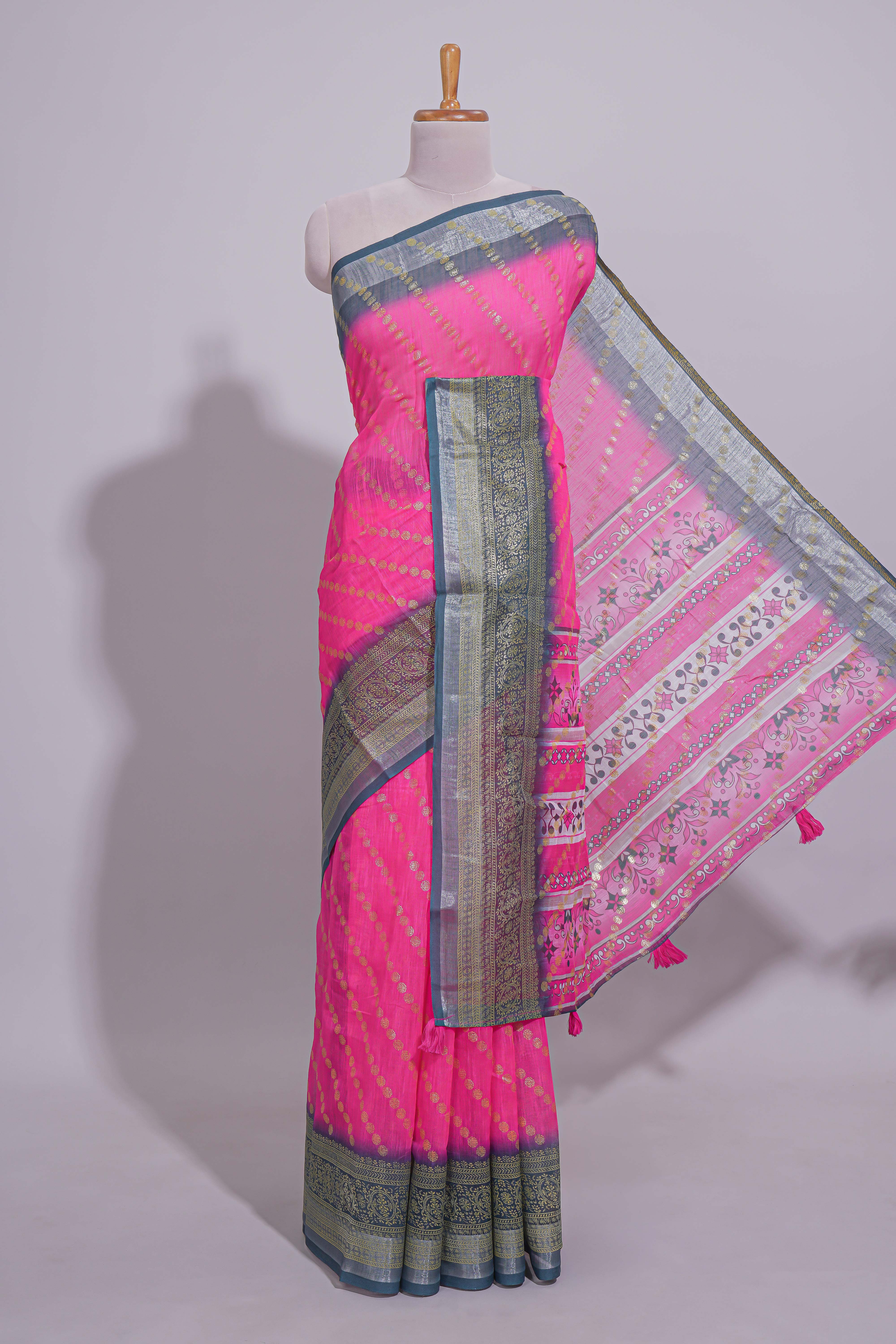 Pink colour linen cotton saree with zari striped body and contrast border with geometric pallu along with contrast blouse