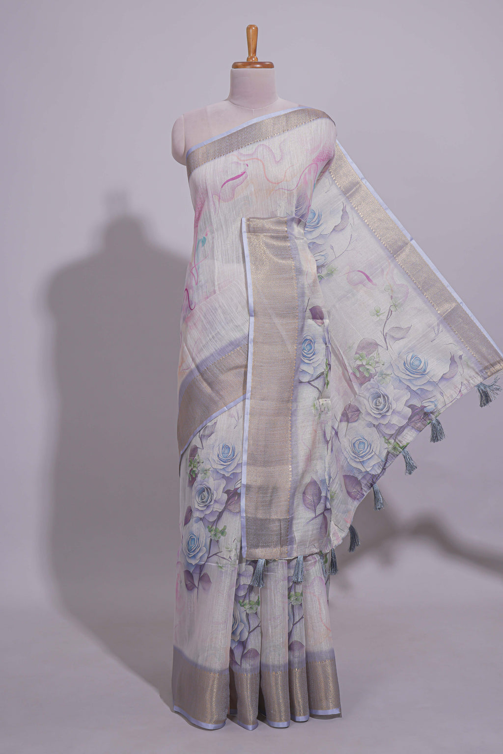 Ivory Floral printed linen cotton saree with contrast zari  border and self pallu along with contrast blouse