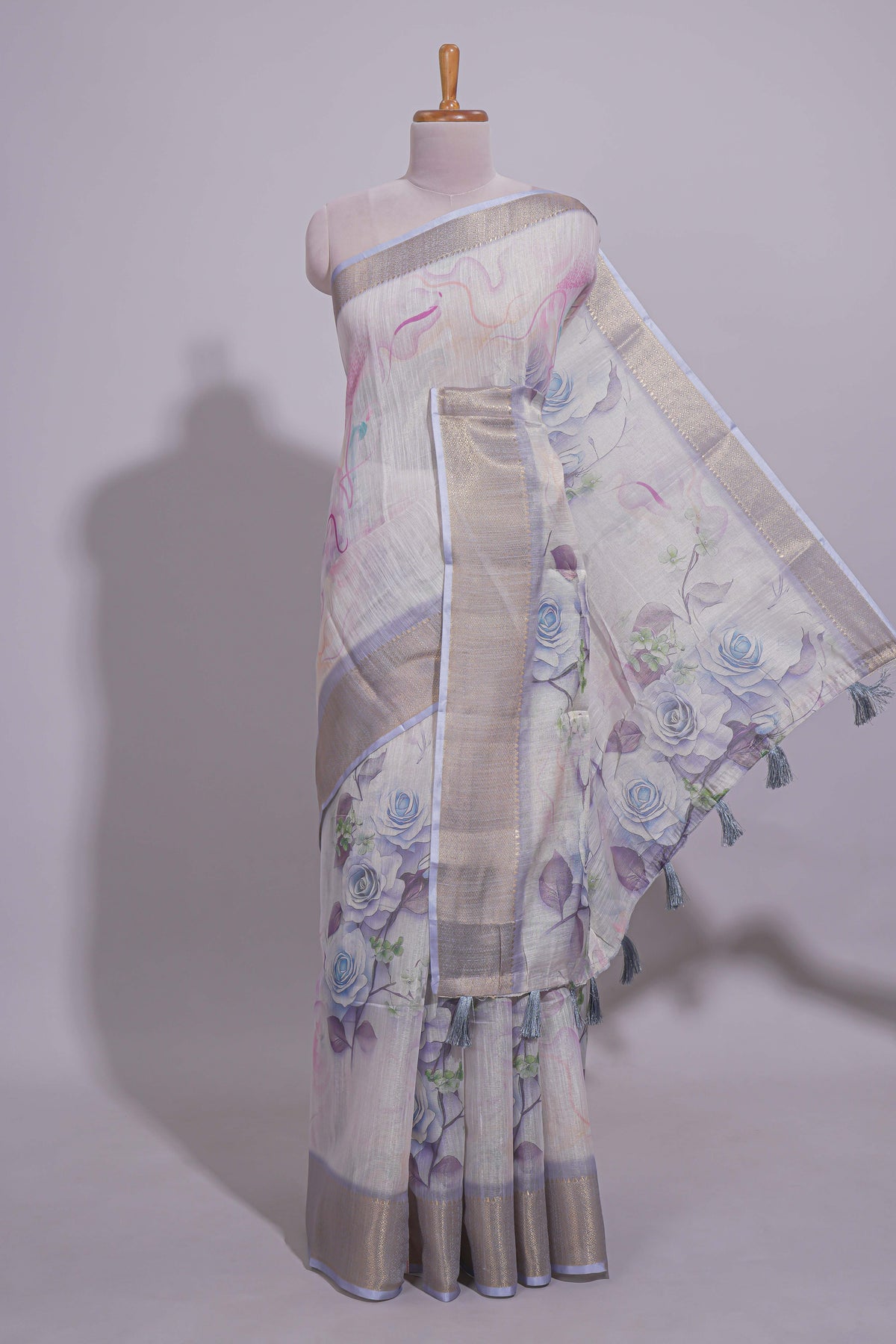 Ivory Floral printed linen cotton saree with contrast zari  border and self pallu along with contrast blouse