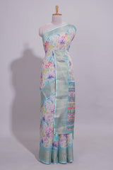 Ivory Floral linen cotton saree with contrast zariborder and self pallu along with contrast blouse