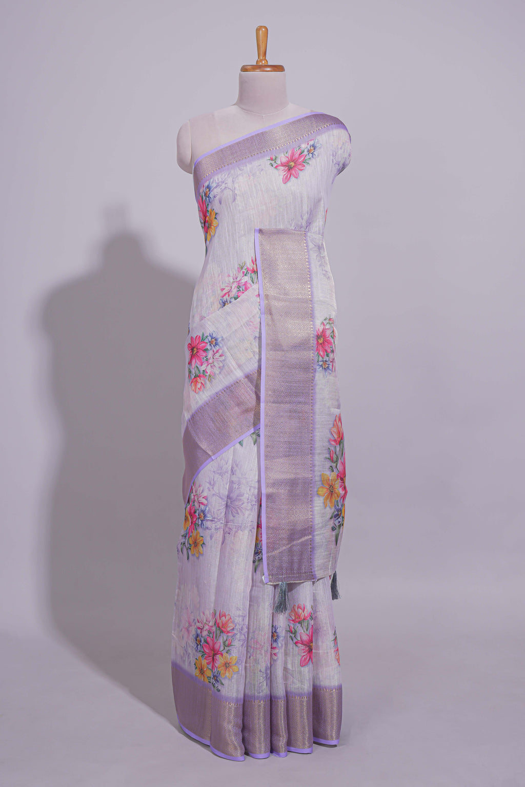 White Floral printed linen cotton saree with contrast zari  border and self pallu along with matching blouse