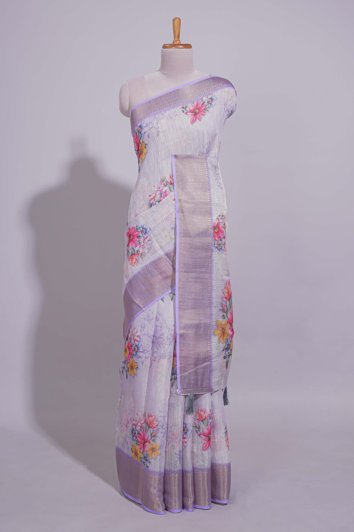 White Floral printed linen cotton saree with contrast zari  border and self pallu along with matching blouse