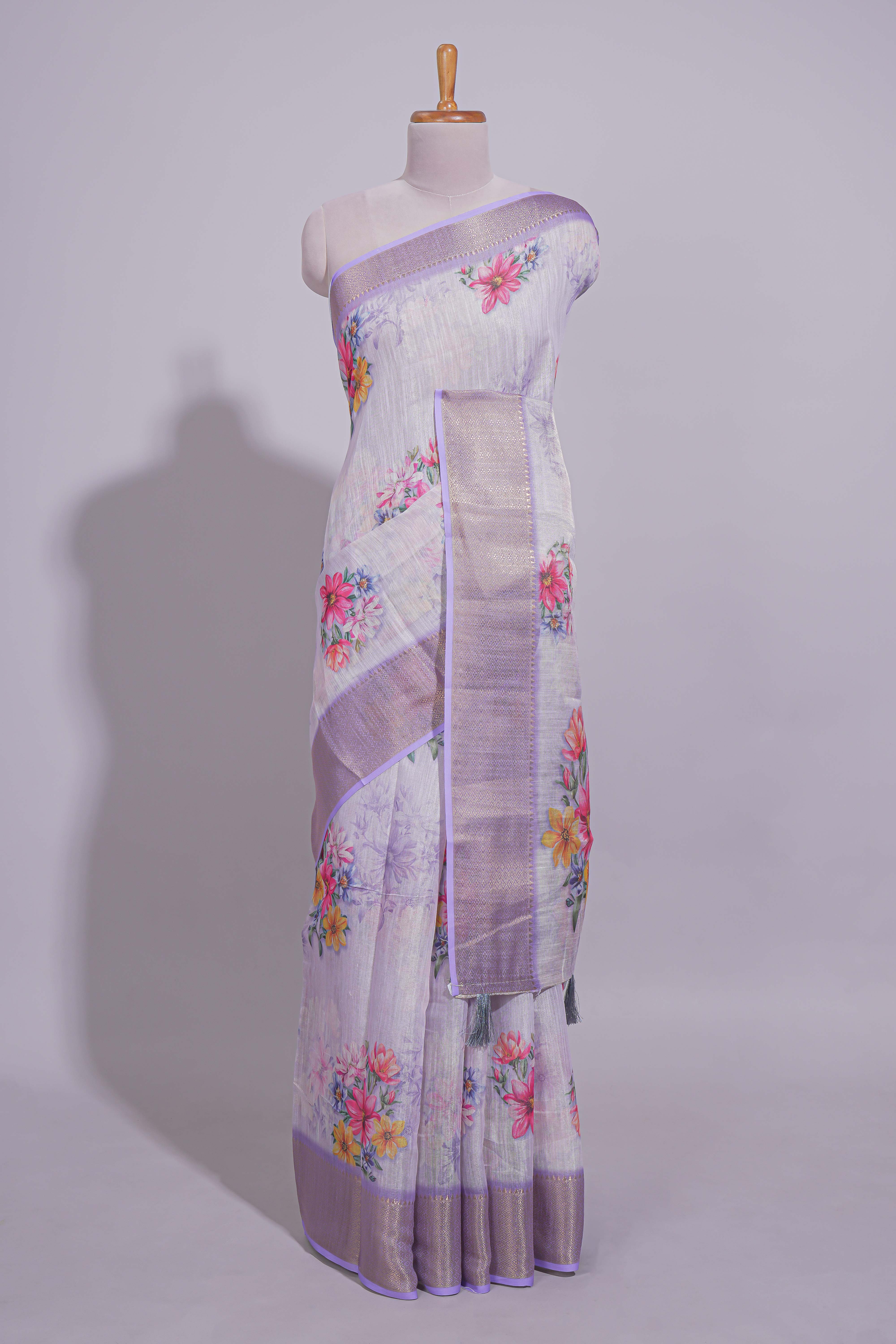 White Floral printed linen cotton saree with contrast zariborder and self pallu along with matching blouse