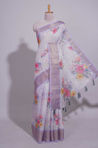 White Floral printed linen cotton saree with contrast zari  border and self pallu along with matching blouse