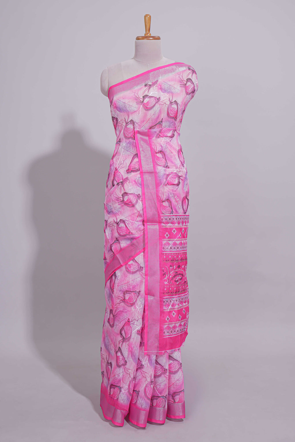 Pink Floral printed linen cotton saree with contrast zari  border and geometric pallu along with matching blouse