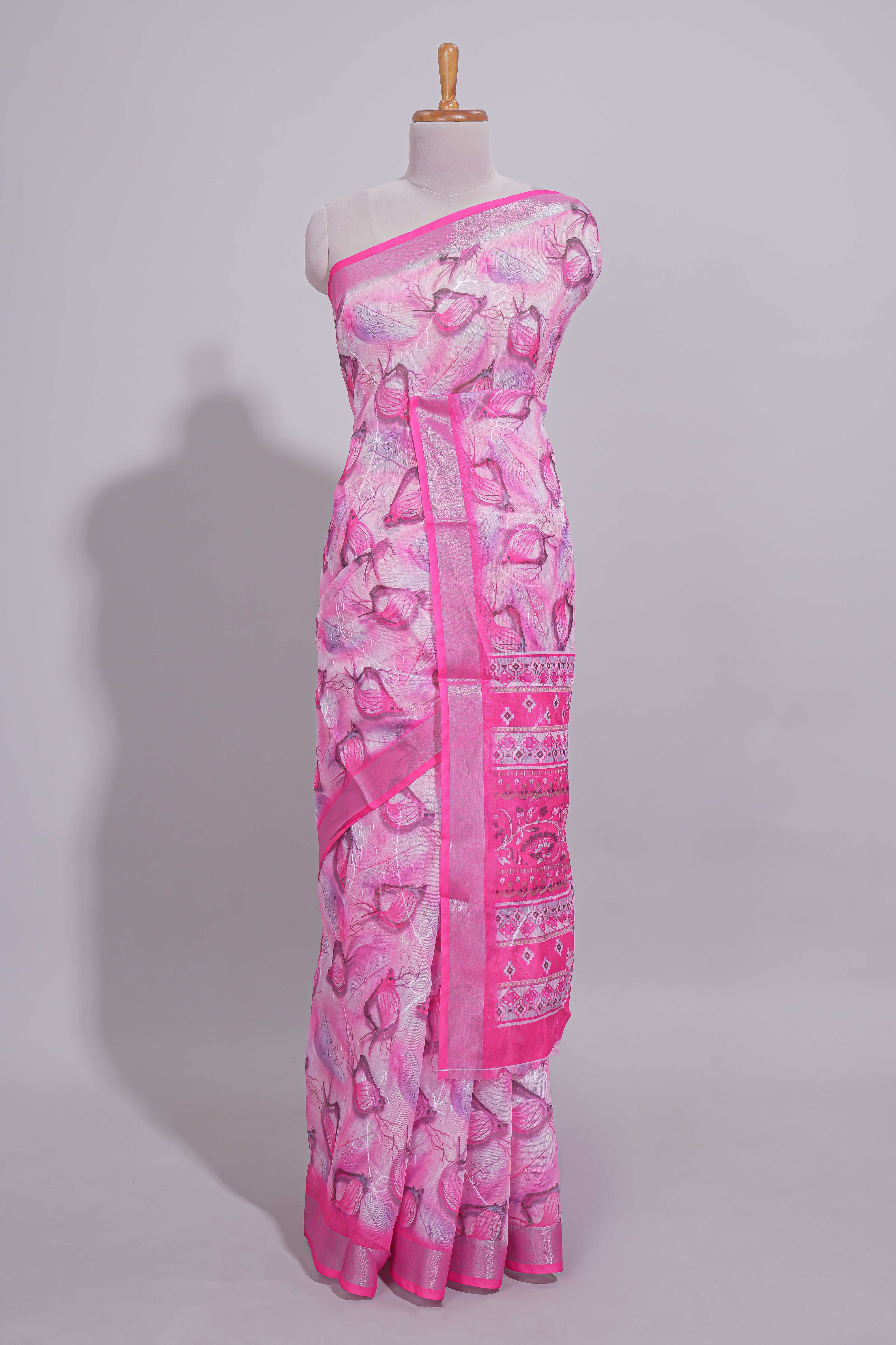 Pink Floral printed linen cotton saree with contrast zariborder and geometric pallu along with matching blouse