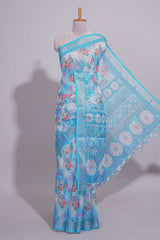 Blue Floral printed linen cotton saree with contrast zariborder and geometric pallu along with matching blouse
