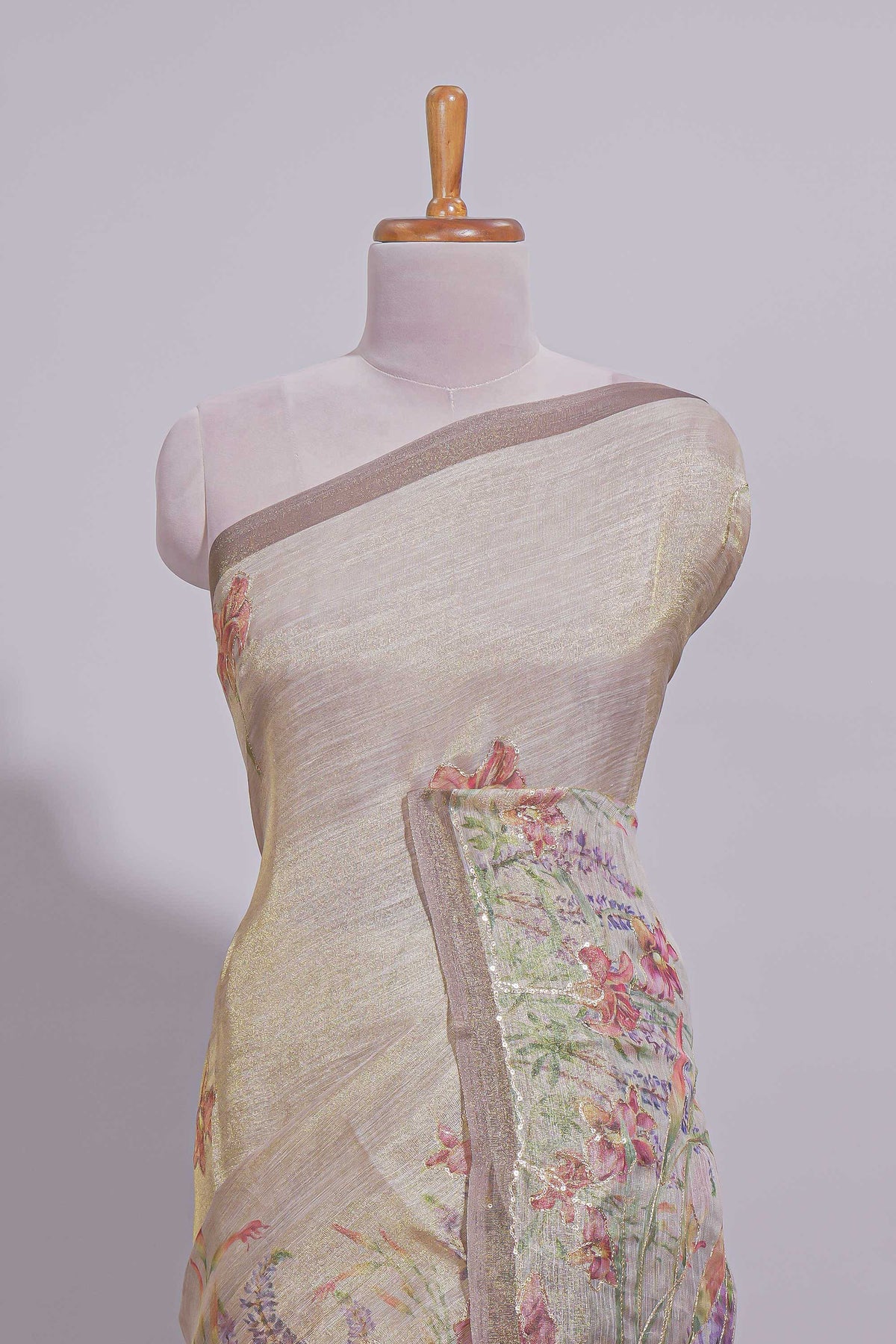 Soft olive green Floral printed linen cotton saree with contrast zari  border and self pallu along with matching blouse