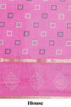 Checked linen saree with contrast border and pallu along with contrast printed blouse