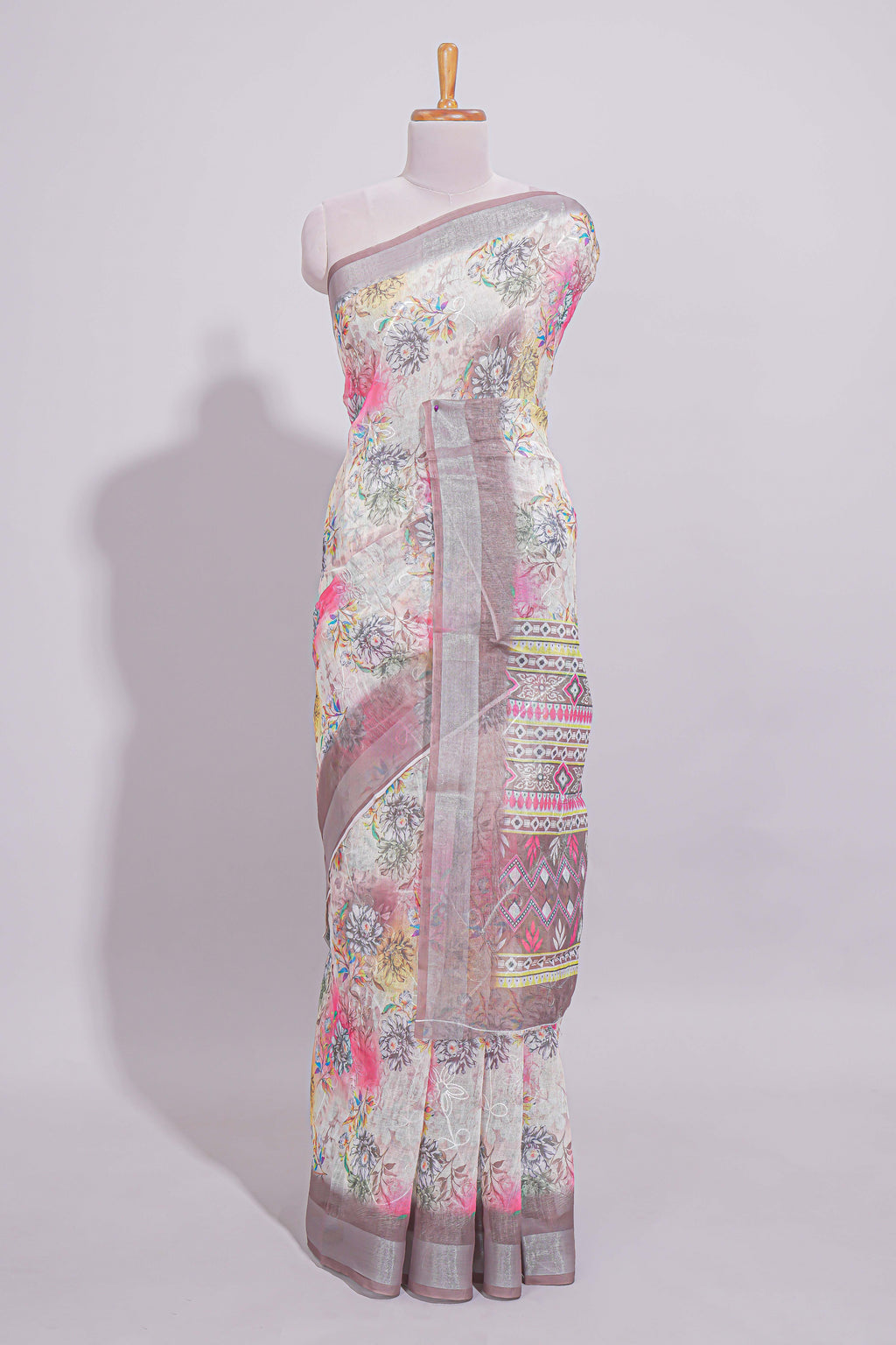 White Floral  linen cotton saree with contrast zari  border and geometric pallu along with matching blouse
