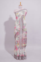 White Floral  linen cotton saree with contrast zari  border and geometric pallu along with matching blouse