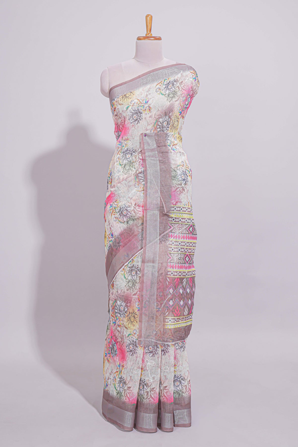 White Floral  linen cotton saree with contrast zari  border and geometric pallu along with matching blouse
