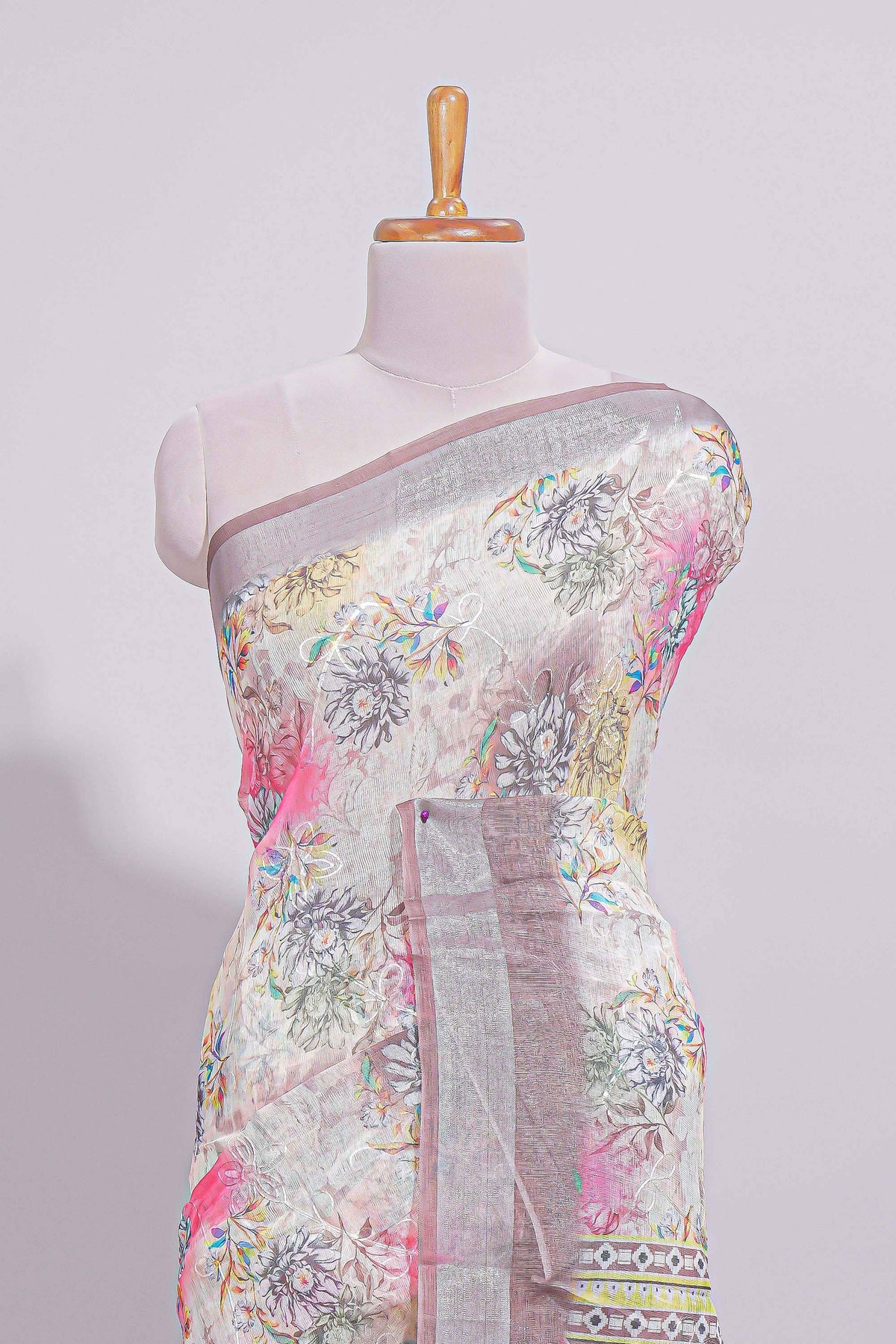 White Floral  linen cotton saree with contrast zari  border and geometric pallu along with matching blouse