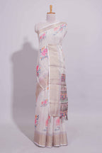 Ivory colour Floral printed linen cotton saree with contrast zari  border and geometric pallu along with matching blouse