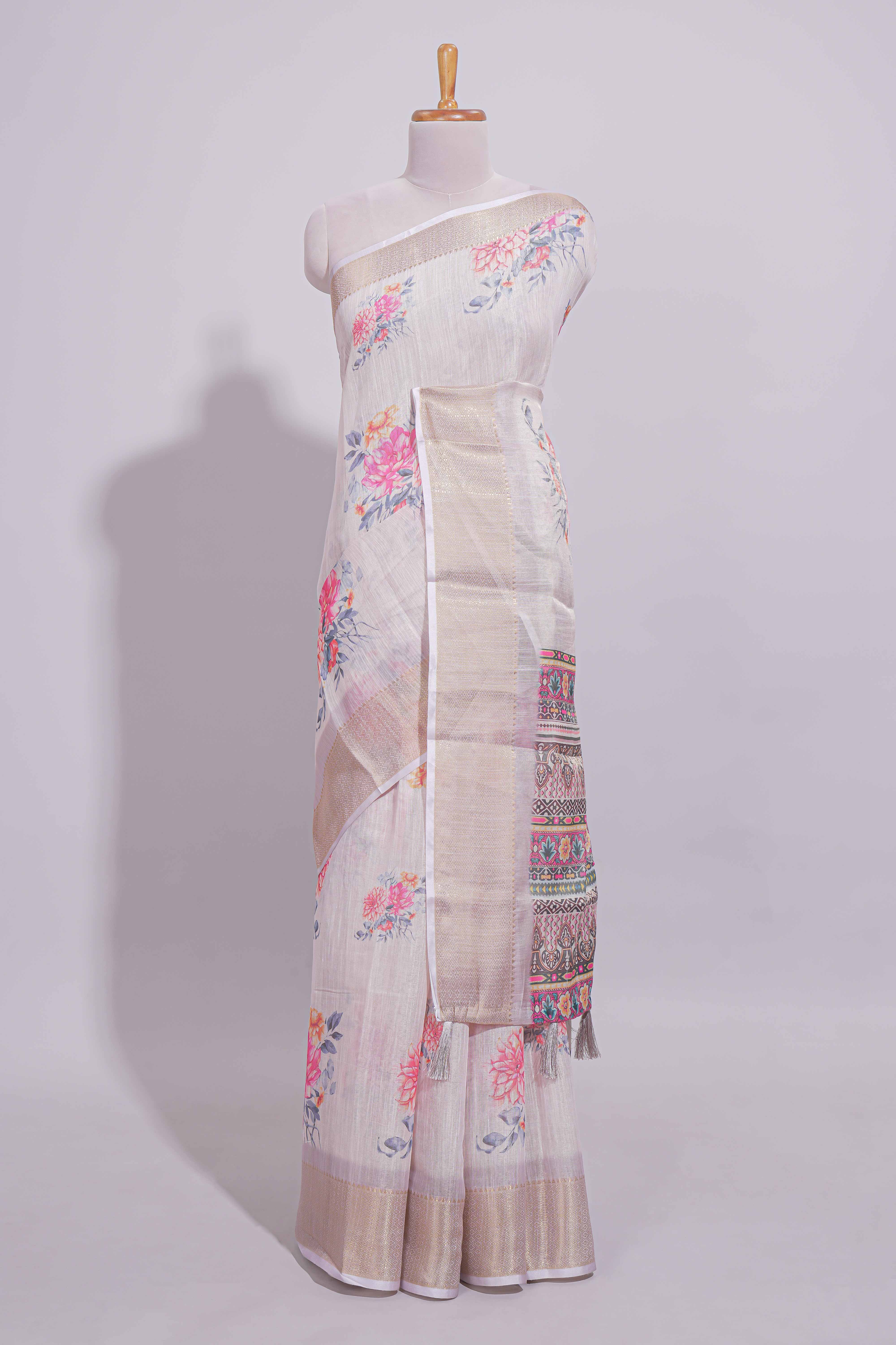 Ivory colour Floral printed linen cotton saree with contrast zariborder and geometric pallu along with matching blouse