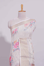 Ivory colour Floral printed linen cotton saree with contrast zari  border and geometric pallu along with matching blouse