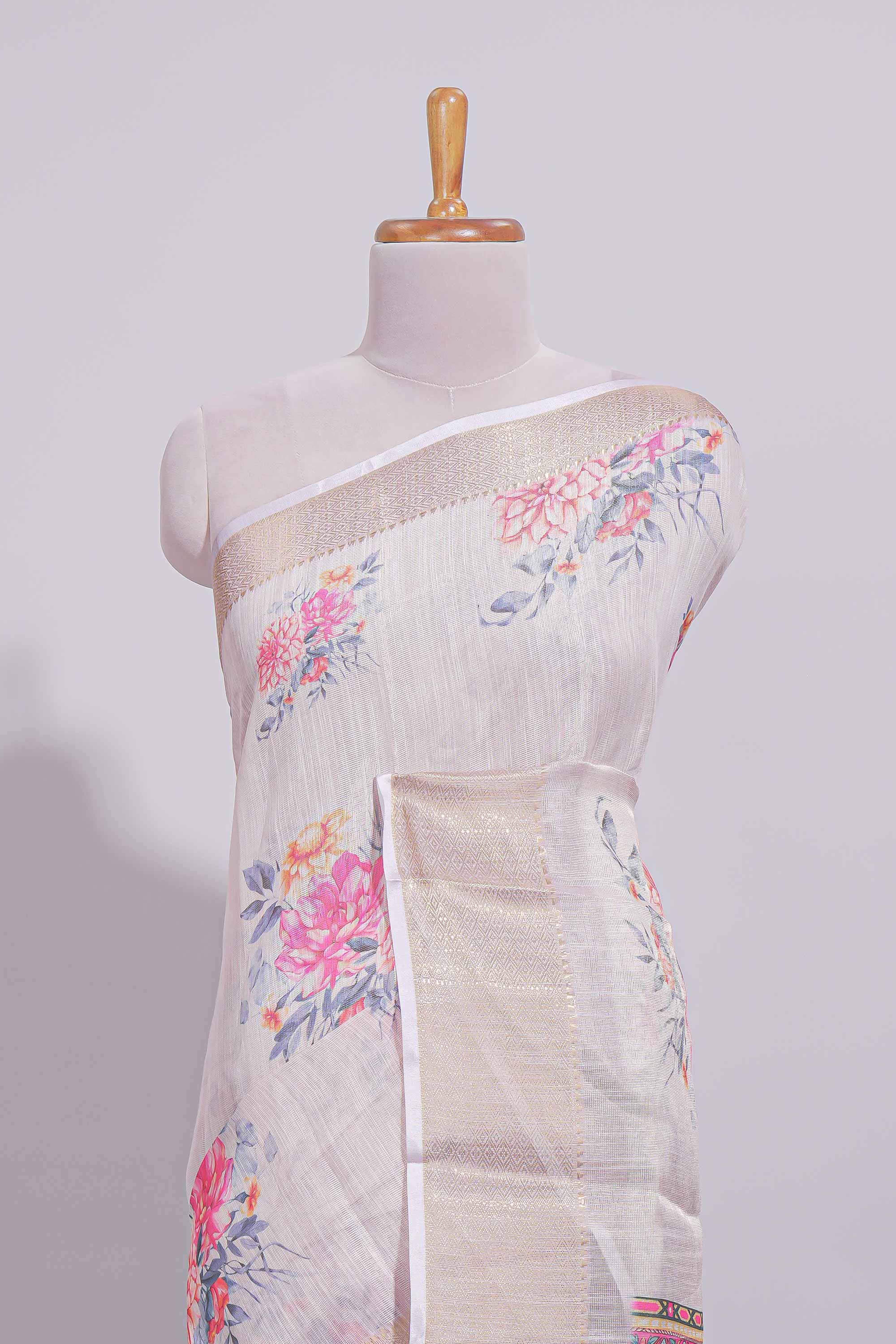 Ivory colour Floral printed linen cotton saree with contrast zariborder and geometric pallu along with matching blouse