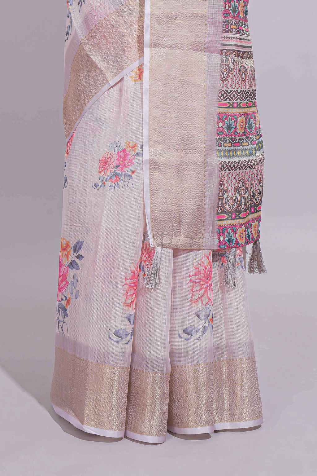 Ivory colour Floral printed linen cotton saree with contrast zari  border and geometric pallu along with matching blouse