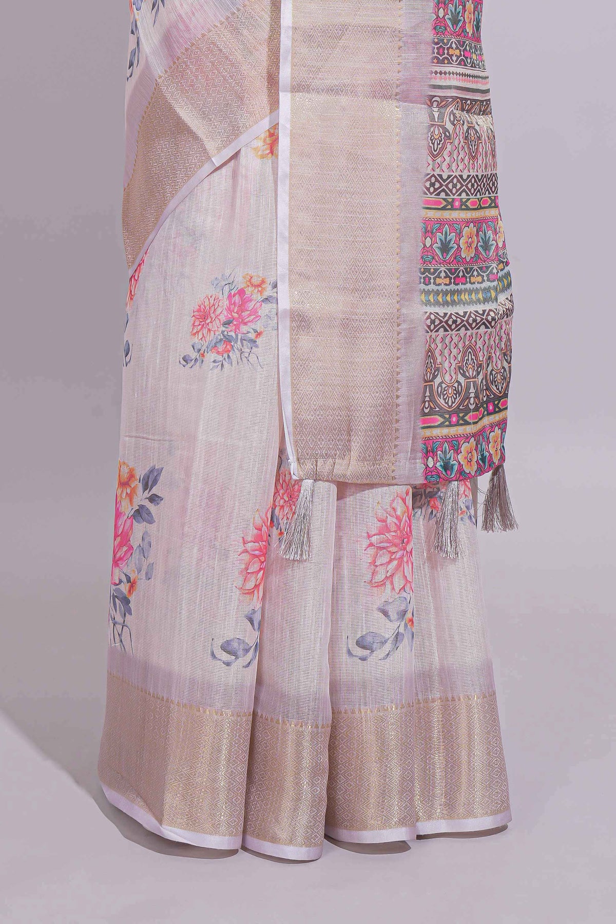 Ivory colour Floral printed linen cotton saree with contrast zari  border and geometric pallu along with matching blouse