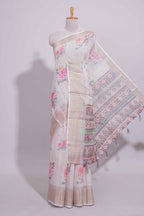 Ivory colour Floral printed linen cotton saree with contrast zari  border and geometric pallu along with matching blouse