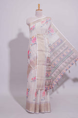 Ivory colour Floral printed linen cotton saree with contrast zariborder and geometric pallu along with matching blouse