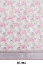 Ivory colour Floral printed linen cotton saree with contrast zari  border and geometric pallu along with matching blouse