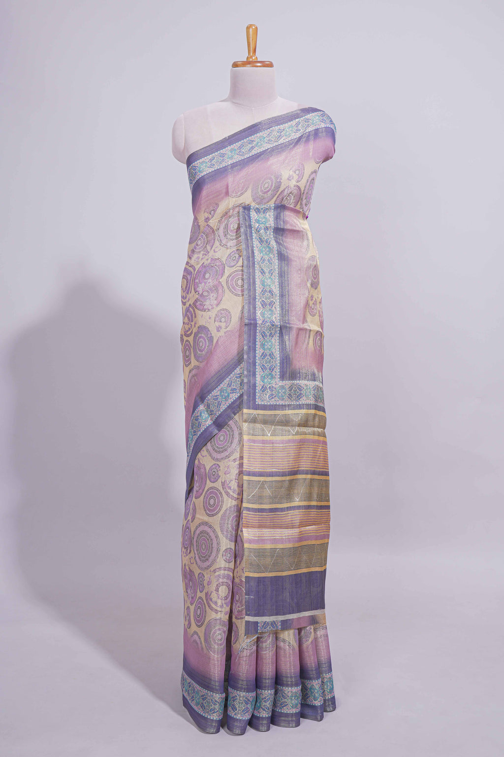 Beige colour linen cotton saree with geometric design body and contrast border with geometric pallu along with matching blouse
