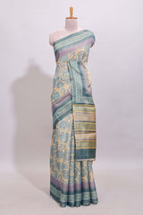 Beige colour linen cotton saree with geometric design body and contrast sea green border with geometric pallu along with matching blouse