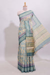 Beige colour linen cotton saree with geometric design body and contrast sea green border with geometric pallu along with matching blouse