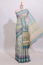 Beige colour linen cotton saree with geometric design body and contrast sea green border with geometric pallu along with matching blouse